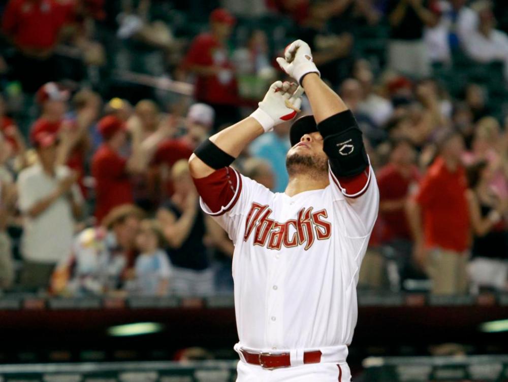 Arizona Diamondbacks' Welington Castillo getures as he crosses the plate after hitting a solo home run against the Philadelphia Phillies during the fifth inning of a baseball game, Monday, Aug. 10, 2015, in Phoenix. (AP Photo/Ralph Freso)